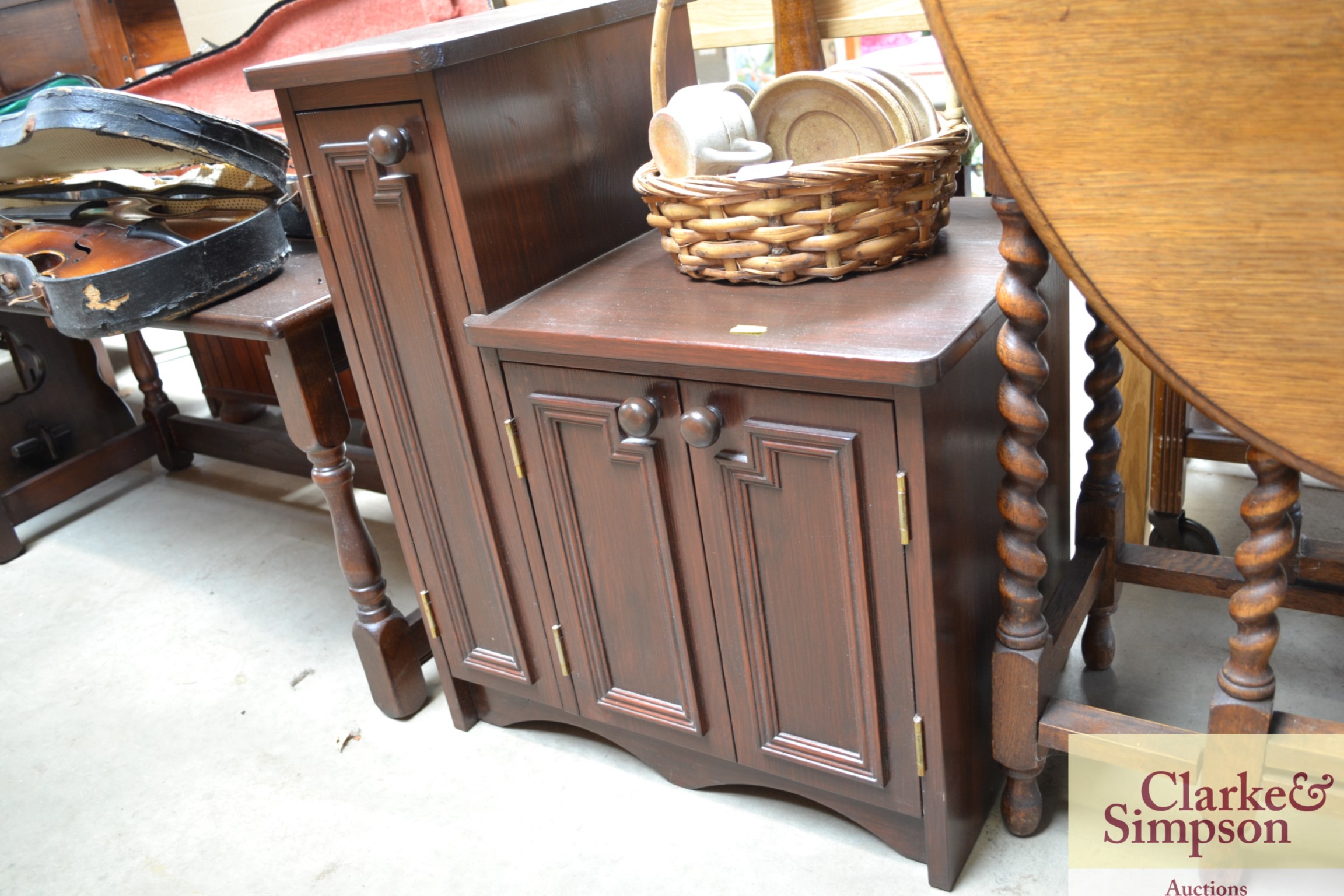 A stained pine telephone table