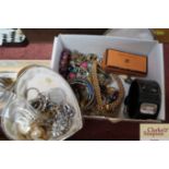 A box of various costume jewellery