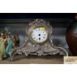 A single hole mantel clock