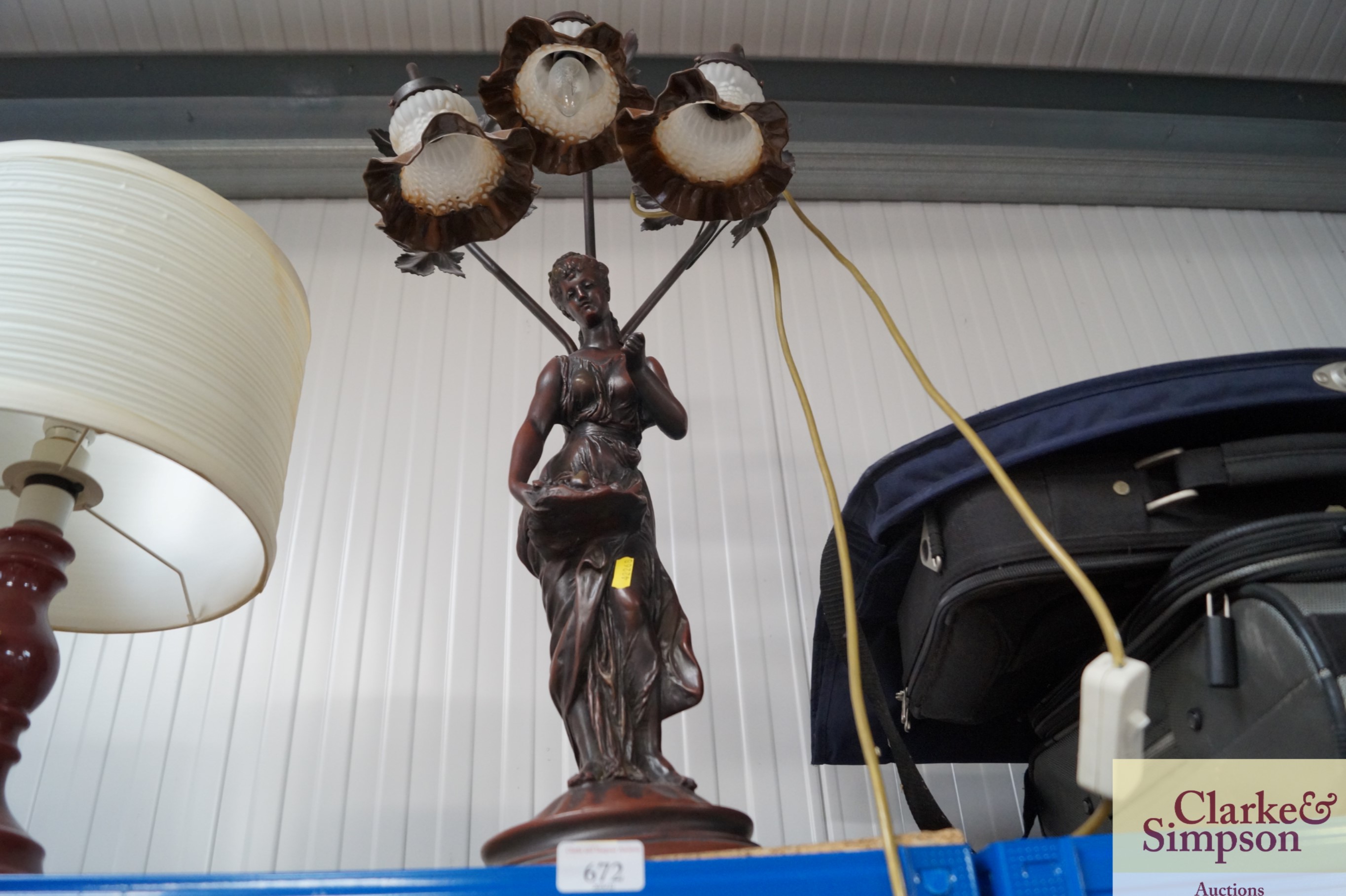 An Art Deco style figural lamp