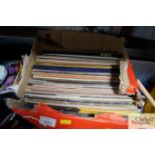 A box of various records