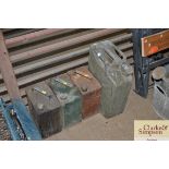 Three vintage Esso petrol cans and one other petro