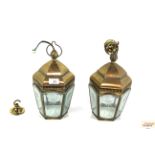 A pair of hallway brass electric pendant lanterns