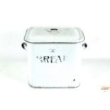 A vintage enamel bread bin