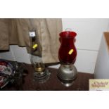 A glass oil lamp with Hinks burner and one other