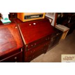 A 19th Century mahogany bureau fitted three long d