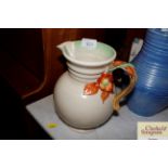 A Clarice Cliff design baluster water jug with lea
