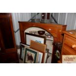 An antique stripped pine hanging corner cupboard