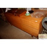 A light oak sideboard fitted double cupboards and