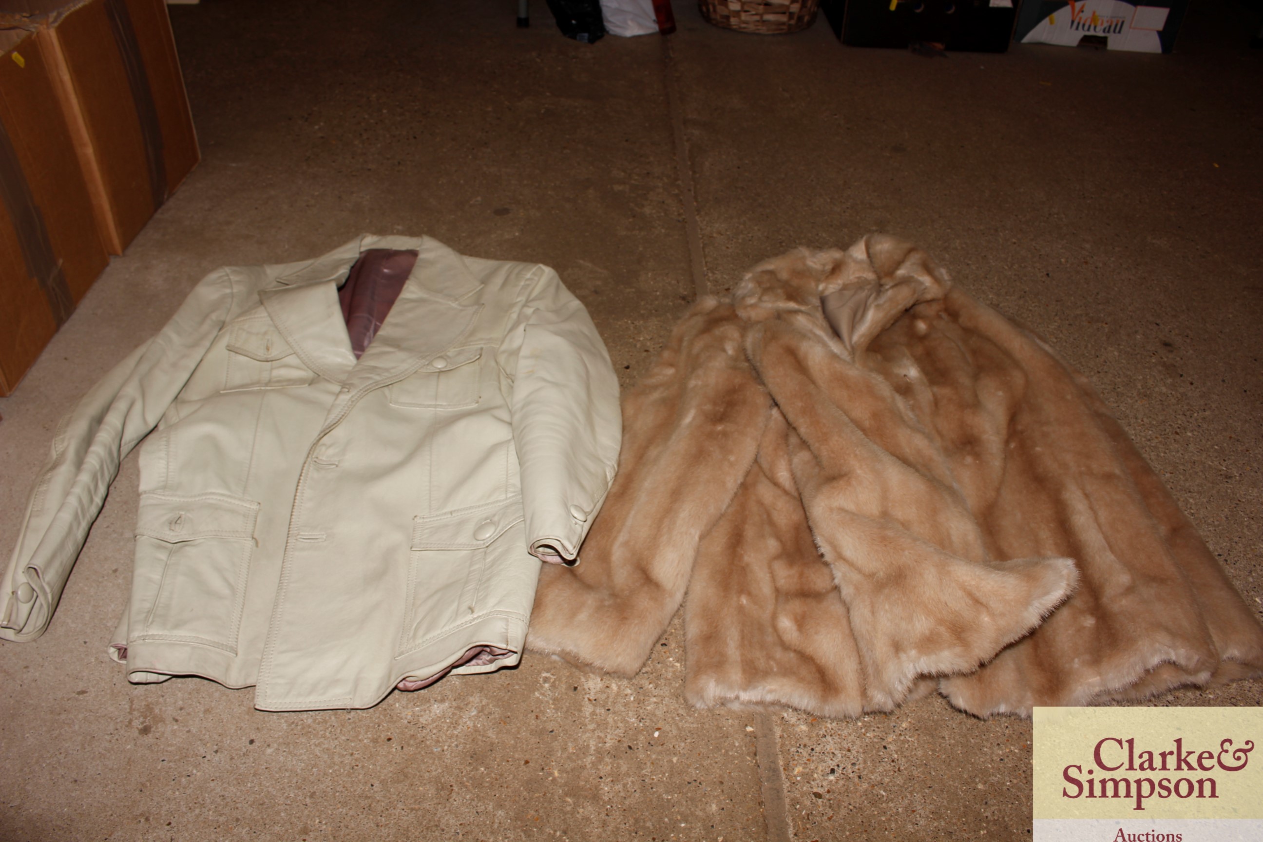 A faux lady's fur jacket; and one other lady's jac
