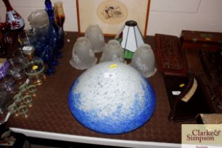 A large Art Glass shade and a Tiffany style shade