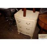 An Olympus Louis style three drawer chest