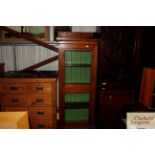 A Victorian golden oak display cabinet