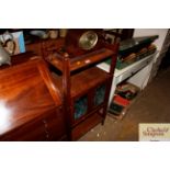 A glazed mahogany cabinet