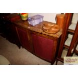 A Victorian chest fitted four short over two long drawers enclosed by panelled doors