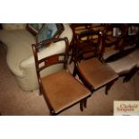 A pair of 19th Century rope back dining chairs