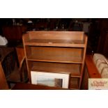 An oak open fronted bookcase