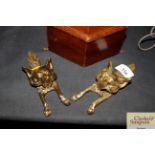 Two brass door knockers in the form of foxes