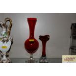 Two ruby glass vases
