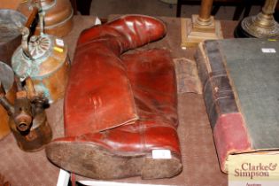 A pair of vintage leather officers boots