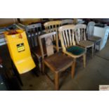 Two oak dining chairs together with two slat back