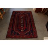 An approx. 5'1" x 3' Balochi rug