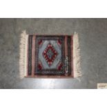 An approx. 1'x1' fine Mori Jaldar rug