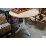 A circular beech kitchen table