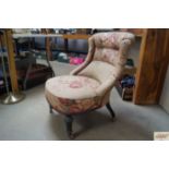 A floral upholstered nursing chair (AF)