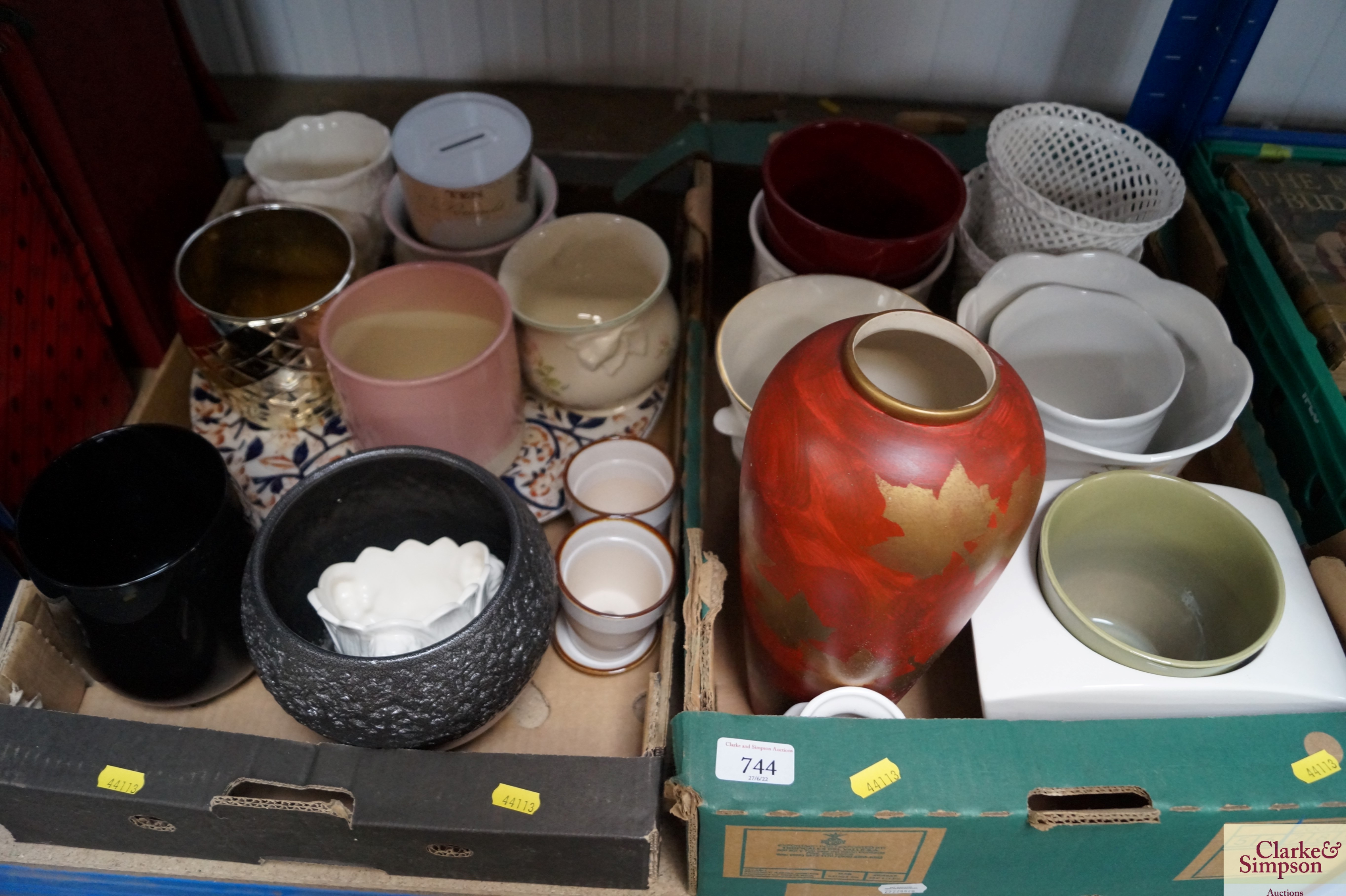 Two boxes containing various vases; plant pots etc