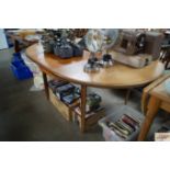 A teak G-Plan extending dining table