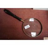 A silver plated 6" magnifying glass (13)