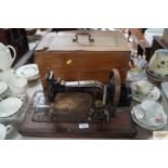A Frister & Rossmann sewing machine in fitted case