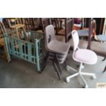 A child's office chair, dolls high chair and cot t