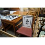 A 1970's teak extending table and a set of rollbac