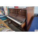 A Rogers of London upright piano