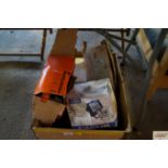 A box containing a stadium flood light; Black & De