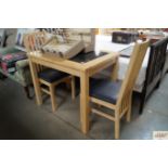 A beech kitchen table and two chairs
