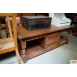 An linen fold decorated coffee table