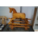 A child's wooden rocking horse