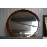 A bevelled edge wall mirror