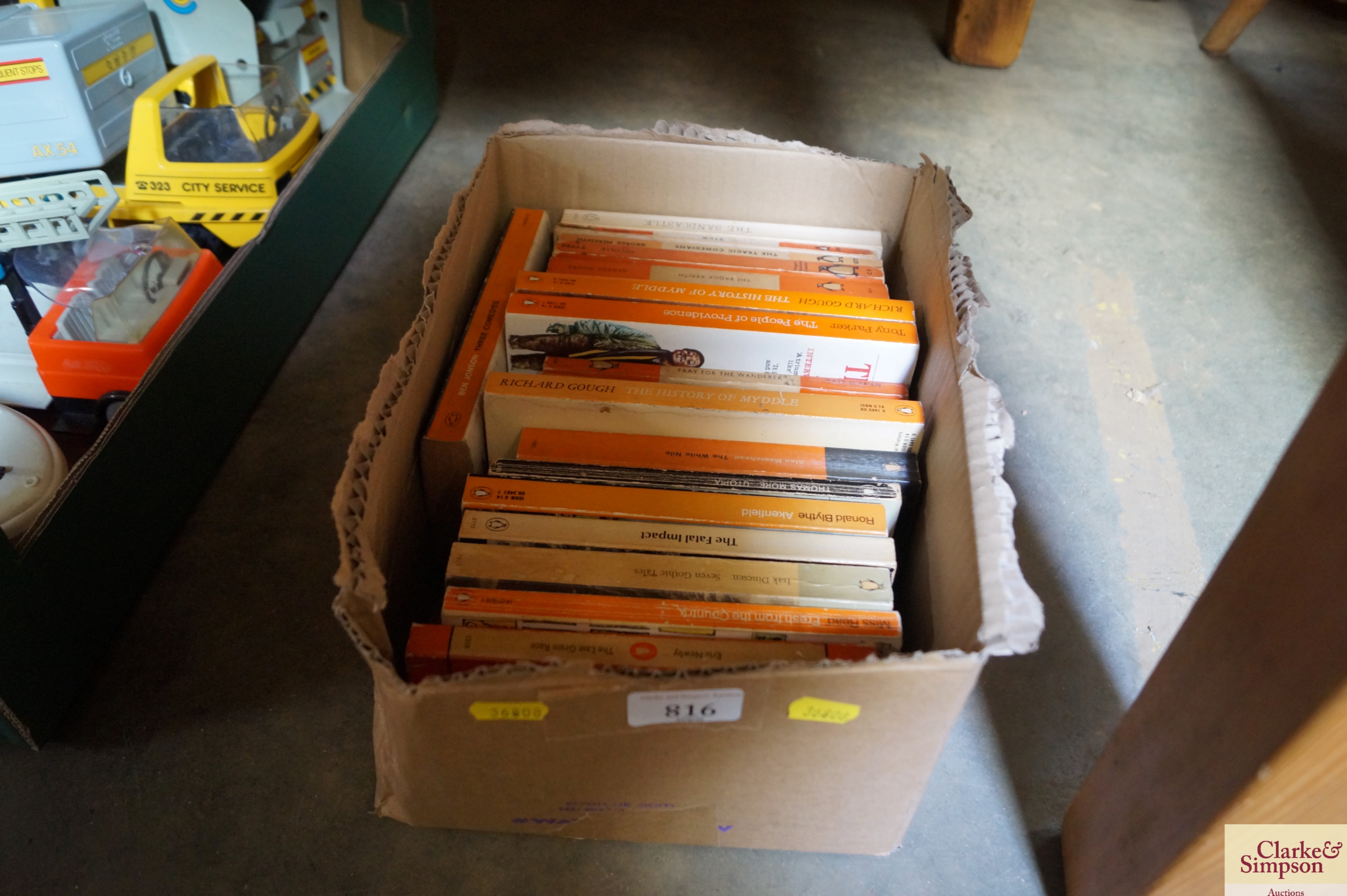 A box containing Penguin books