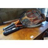 A quantity of various tennis rackets