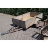 An approx. 4' x 6' single axle car trailer