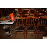 A set of eight spindle back dining chairs