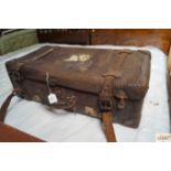 A vintage walrus skin suitcase