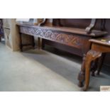 A carved oak bench