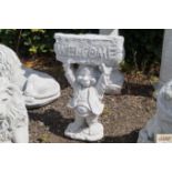 A concrete garden ornament "Welcome"