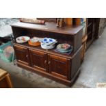 A stained pine sideboard