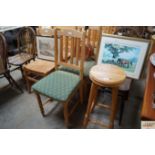 A set of six pine slat back dining chairs